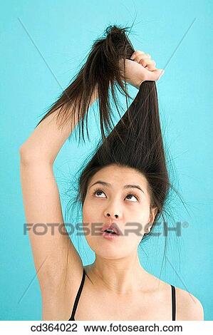 Asian, Chinese, bewilderment, bewildered, Arms raised View Large Photo Image Stock Image - Asian, Chinese, bewilderment, bewildered, Arms raised. Fotosearch