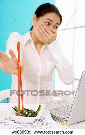 Stock Photography - Asian, chopstick, business, 20's. Fotosearch