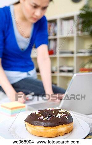 Asian, computer, chocolate, 20's View Large Photo Image Picture - Asian, computer, chocolate, 20's. Fotosearch