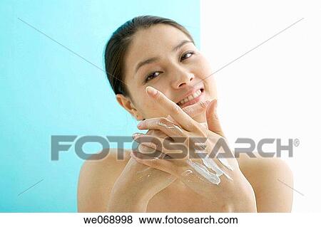 Asian, contemporary, Body care, apply View Large Photo Image Stock Photo - Asian, contemporary, Body care, apply. Fotosearch
