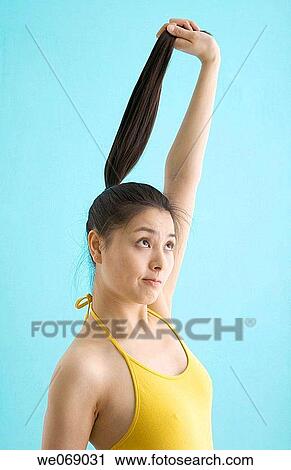 Asian, ethnic, contemporary, Arms raised View Large Photo Image Stock Image - Asian, ethnic, contemporary, Arms raised. Fotosearch