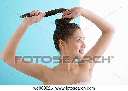 Asian, ethnic, contemporary, Arms raised View Large Photo Image Stock Photography - Asian, ethnic, contemporary, Arms raised. Fotosearch