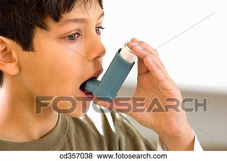 Stock Photo - asthmatic, child, boy, black hair, asthma. Fotosearch