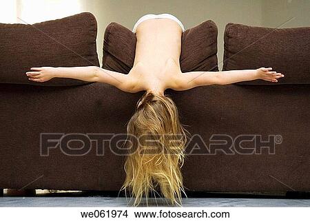 at-home, blond, balance, back, Arms open View Large Photo Image Picture - at-home, blond, balance, back, Arms open. Fotosearch
