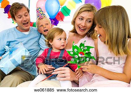 at-home, bond, Birthday party, baby, affection View Large Photo Image Stock Photography - at-home, bond, Birthday party, baby, affection. Fotosearch