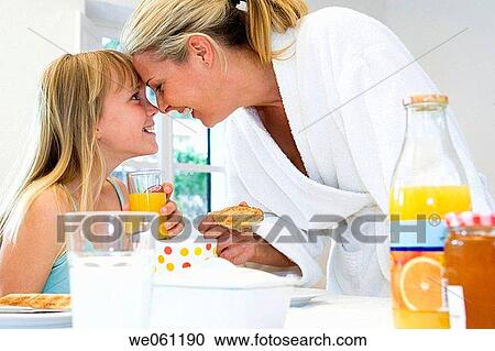 Stock Image - at-home, bonding, bond, bathrobe, affection. Fotosearch