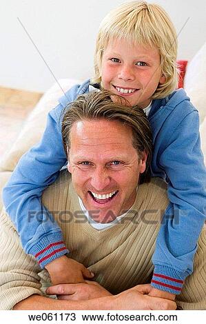 at-home, boy, bonding, bond, affection View Large Photo Image Stock Image - at-home, boy, bonding, bond, affection. Fotosearch