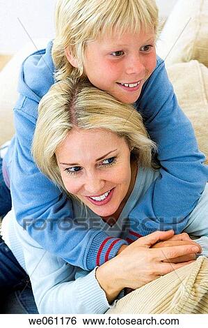 at-home, boy, bonding, bond, affection View Large Photo Image Stock Photograph - at-home, boy, bonding, bond, affection. Fotosearch