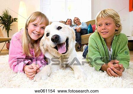 Picture - at-home, brother, boy, animal. Fotosearch