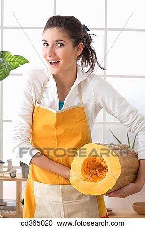 at-home, brunette, apron View Large Photo Image Stock Image - at-home, brunette, apron. Fotosearch