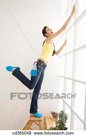 Stock Photo - at-home, brunette, balance, ability. Fotosearch