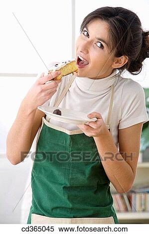 at-home, calorie, cake, brunette, apron View Large Photo Image Stock Photography - at-home, calorie, cake, brunette, apron. Fotosearch