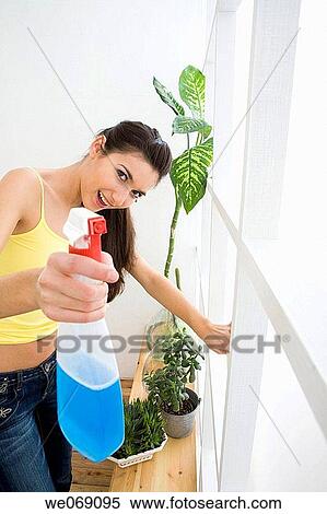at-home, clean, brunette, amusement View Large Photo Image Stock Photography - at-home, clean, brunette, amusement. Fotosearch