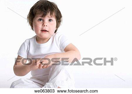 Stock Image - attention, brunette, baby, attentive, 3-4 years. Fotosearch