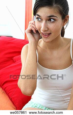 attention, calling, brunette, attentive, at-home View Large Photo Image Stock Image - attention, calling, brunette, attentive, at-home. Fotosearch