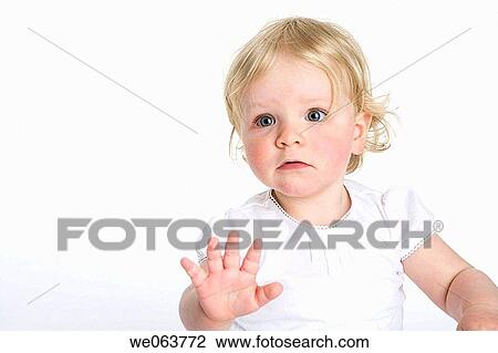Stock Image - attentive, blue eyes, blond, baby, attention. Fotosearch