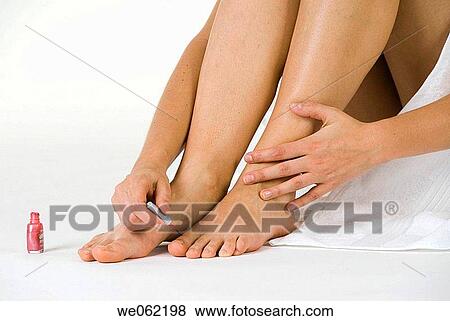 Stock Photo - attractive, beauty, beautiful, barefoot, attitude. Fotosearch