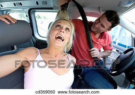 automobile, car, blond, black hair, amusing View Large Photo Image Stock Image - automobile, car, blond, black hair, amusing. Fotosearch