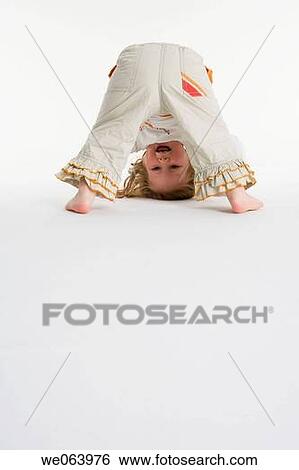 Stock Photograph - baby, barefoot, balance, back view, ability. Fotosearch