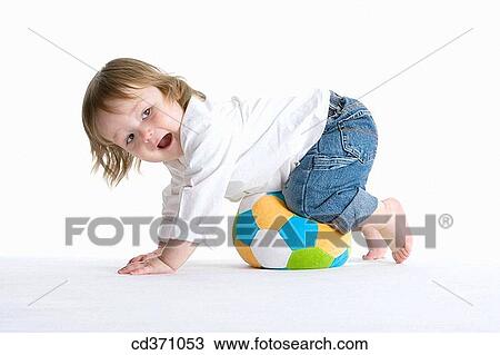 baby, barefoot, ball, balance, amusement View Large Photo Image Stock Image - baby, barefoot, ball, balance, amusement. Fotosearch