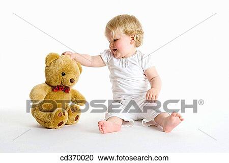 baby, barefoot, blond, child, childhood View Large Photo Image Stock Image - baby, barefoot, blond, child, childhood. Fotosearch