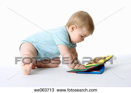 baby, barefoot, child, childhood, Cloth book View Large Photo Image Stock Image - baby, barefoot, child, childhood, Cloth book. Fotosearch