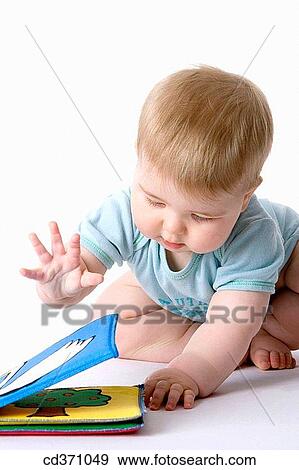 baby, barefoot, child, childhood, Cloth book View Large Photo Image Stock Photo - baby, barefoot, child, childhood, Cloth book. Fotosearch