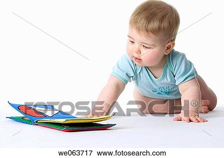 baby, barefoot, child, childhood, Cloth book View Large Photo Image Stock Photo - baby, barefoot, child, childhood, Cloth book. Fotosearch