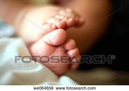 Stock Photo - baby, barefoot, child, Close-up, contemporary. Fotosearch