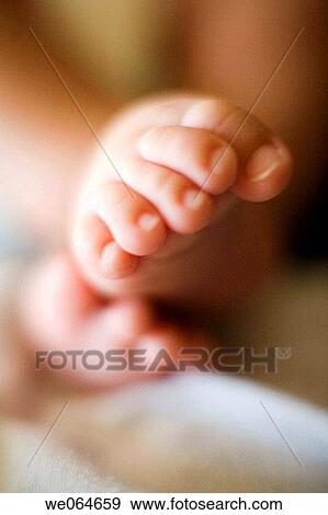 Stock Photo - baby, barefoot, child, Close-up, contemporary. Fotosearch