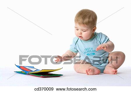 baby, barefoot, child, Cloth book View Large Photo Image Stock Photo - baby, barefoot, child, Cloth book. Fotosearch