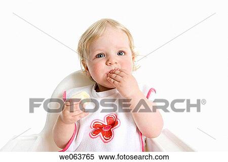 Stock Photography - baby, bib, blond, blue eyes, child. Fotosearch