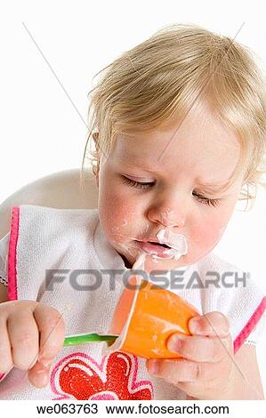 Stock Image - baby, bib, blond, child, childhood. Fotosearch