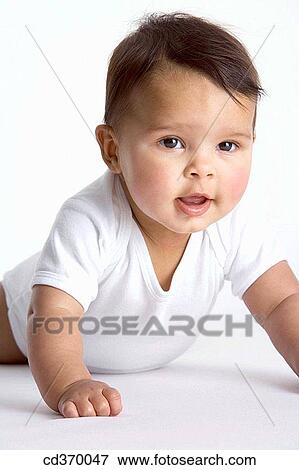 Stock Photo - baby, black hair, child, childhood. Fotosearch