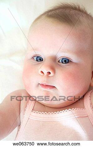 Stock Image - baby, blue eyes, child, childhood, Close-up. Fotosearch