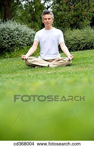 Picture - baby boomer, barefoot. Fotosearch