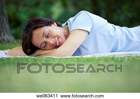 Stock Image - baby boomer, blanket, calm, chilling out. Fotosearch