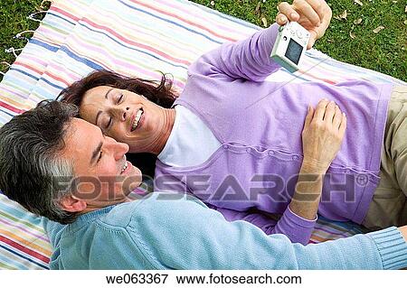 Stock Photo - baby boomer, bonding, bond, blanket, affection. Fotosearch