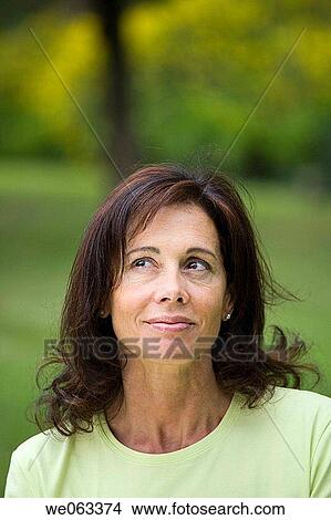 baby boomer, brunette, absorbed View Large Photo Image Picture - baby boomer, brunette, absorbed. Fotosearch