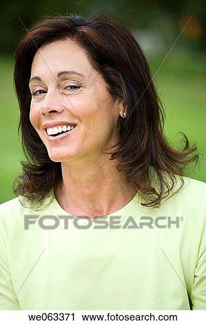 Stock Image - baby boomer, brunette, contemporary. Fotosearch