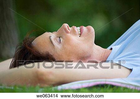 Picture - baby boomer, calm, blanket, Arms raised. Fotosearch
