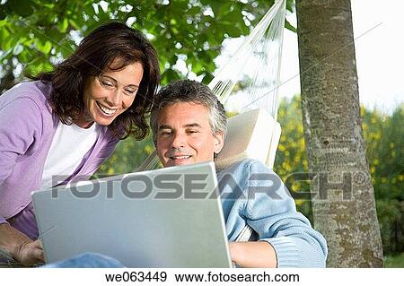 Stock Photo - baby boomer, calm, computer. Fotosearch