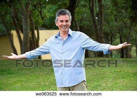 baby boomer, carefree, Arms open View Large Photo Image Stock Photography - baby boomer, carefree, Arms open. Fotosearch