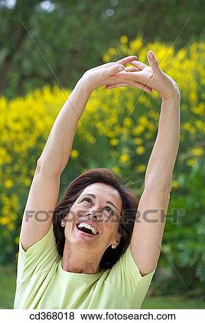 baby boomer, carefree, Arms raised View Large Photo Image Stock Photo - baby boomer, carefree, Arms raised. Fotosearch