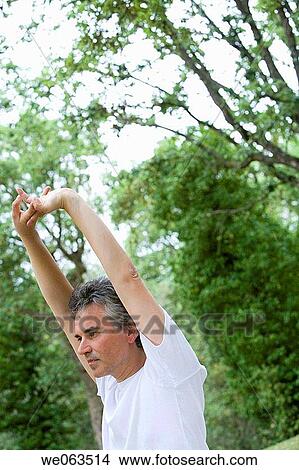 baby boomer, concentrate, Arms raised View Large Photo Image Picture - baby boomer, concentrate, Arms raised. Fotosearch
