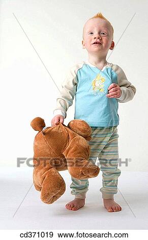 Stock Photo - baby, boy, big, barefoot, 3-4 years. Fotosearch