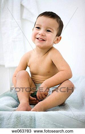 Stock Image - baby, boy, black hair, bathroom, 3-4 years. Fotosearch