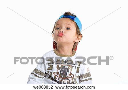 Stock Image - baby, cap, boy, black hair, 3-4 years. Fotosearch