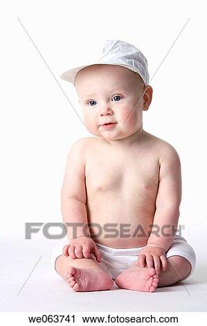 baby, cap, child, childhood View Large Photo Image Stock Image - baby, cap, child, childhood. Fotosearch