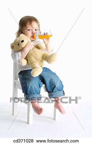 baby, chair, barefoot, Baby bottle, 3-4 years View Large Photo Image Stock Photo - baby, chair, barefoot, Baby bottle, 3-4 years. Fotosearch